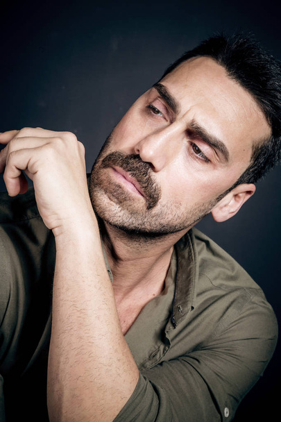 Young handsome man with beard and mustache studio portrait - Φωτογραφία, εικόνα