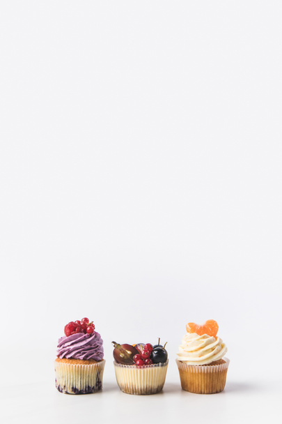 close up view of various sweet cupcakes isolated on white - Valokuva, kuva