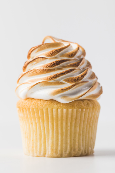 close up view of sweet cupcake with meringue isolated on white - Photo, image