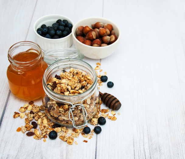 homemade granola in jar - Foto, afbeelding