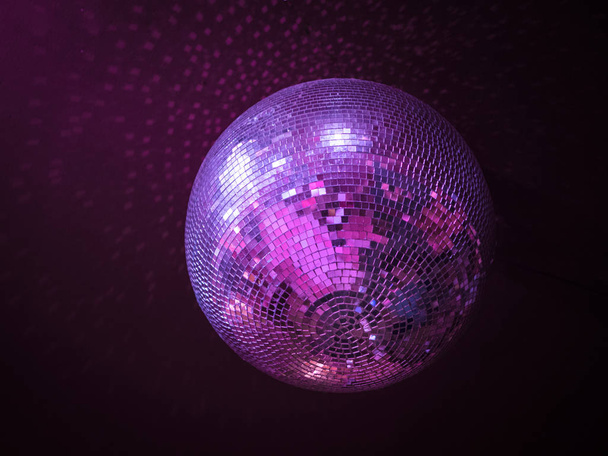Disco ball hanging in a nightclub, club light - Foto, afbeelding