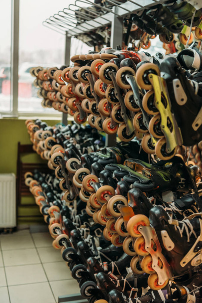 close up view of arranged roller skates in indoors skate park - Foto, imagen
