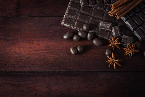 Chocolate, Cinnamon, Chocolate Balls on a Dark Wooden Background - Φωτογραφία, εικόνα