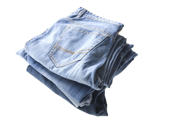 сині джинси на білому тлі
 - Фото, зображення
