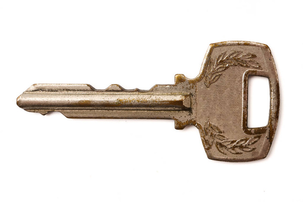 Old key on a white background. - Photo, Image