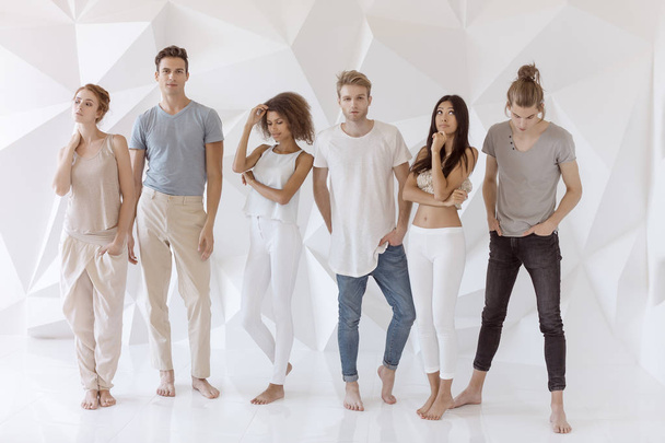 Group of young Multi-ethnic friends indoors in studio - Photo, Image