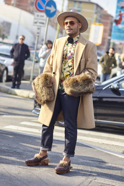MILAN, ITALY - FEBRUARY 21: A fashionable person is seen outside Gucci during Milan Fashion Week Fall/Winter 2018/19 on February 21, 2018 in Milan, Italy. - Фото, изображение