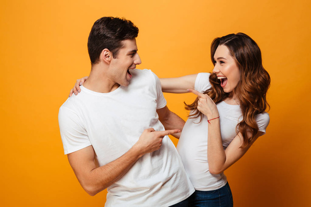 Image of positive adult boy and girl smiling and posing on camer - Photo, Image