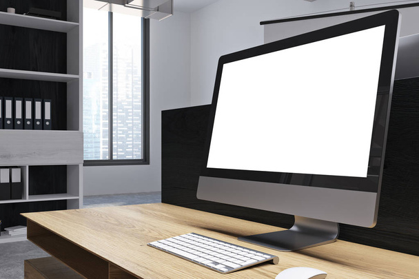 White desktop screen on table in office - Фото, изображение