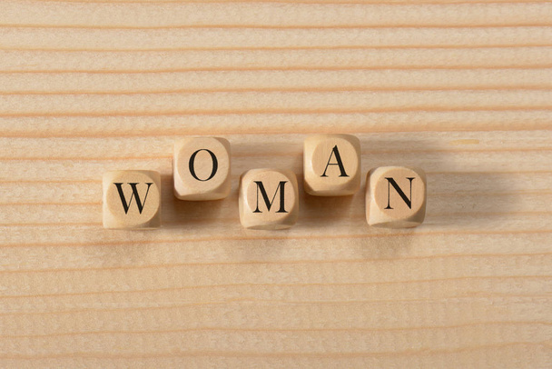 Woman word on wooden cubes. Woman concept - Foto, Imagem