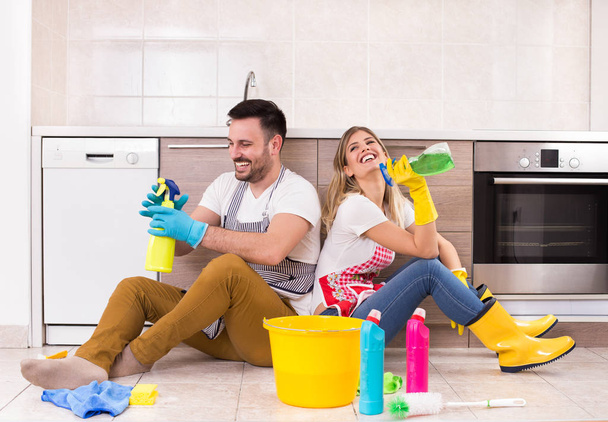 Man and woman happy for finishing chores - 写真・画像
