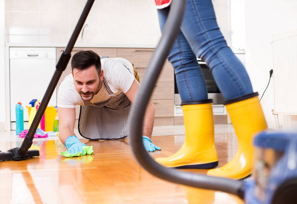 Young couple doing housework together - Photo, Image