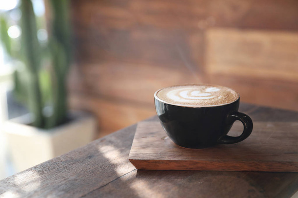 Cappuccino coffee break on wood background - Foto, Bild