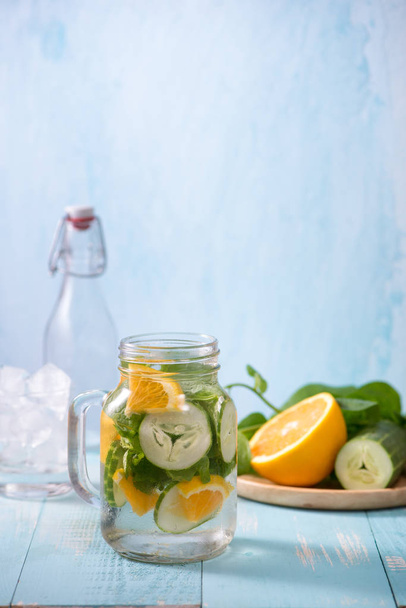 Detox water with vegetables and fruits. Diet healthy eating and weight loss. - Фото, зображення
