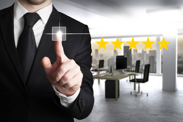 businessman in suit pushing button five star rating - Photo, Image