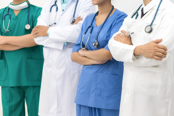 Медицинские работники - врачи, медсестра и хирург
. - Фото, изображение