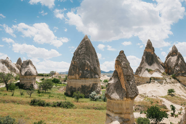 Beautiful view of the hills of Cappadocia. One of the sights of Turkey. Tourism, travel, beautiful landscapes, nature. - Photo, Image