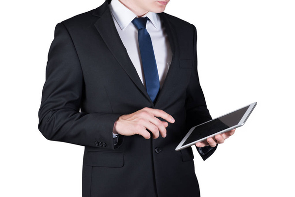 молодой бизнесмен держит планшетный компьютер, изолированный на белом фоне
 - Фото, изображение