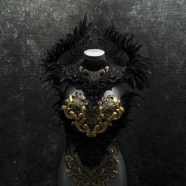 Mysterious gothic style handmade dress with black lace fabrics and piezsa in gold and silver - Foto, afbeelding
