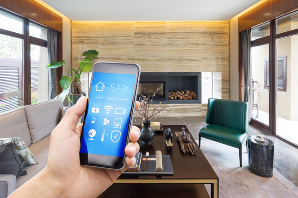smartphone con hogar inteligente y sala de estar moderna
 - Foto, Imagen