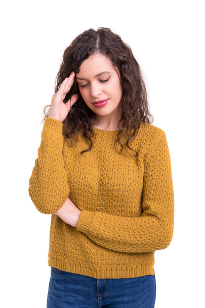 Fiatal nő, egy erős fejfájás, elszigetelt fehér háttér felett - Fotó, kép