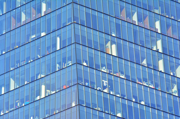 Glass walls of a office building - business background - Photo, Image