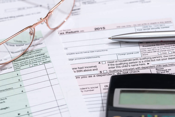us tax form with calculator - Fotografie, Obrázek