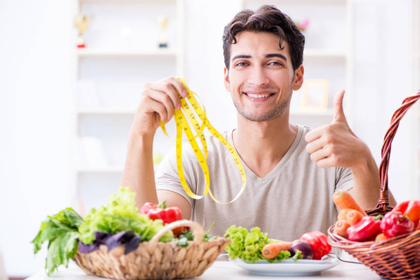 Young man in healthy eating and dieting concept - Photo, Image
