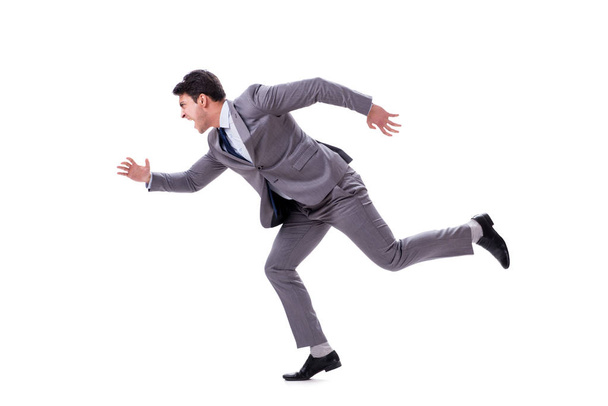 Young businessman running forward isolated on white - Valokuva, kuva