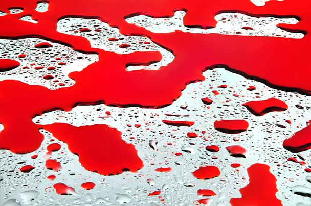 waterdruppels en bloed - Foto, afbeelding