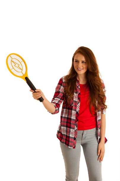 attractive Beautiful young woman holds electroc racket for kilin - Foto, Bild