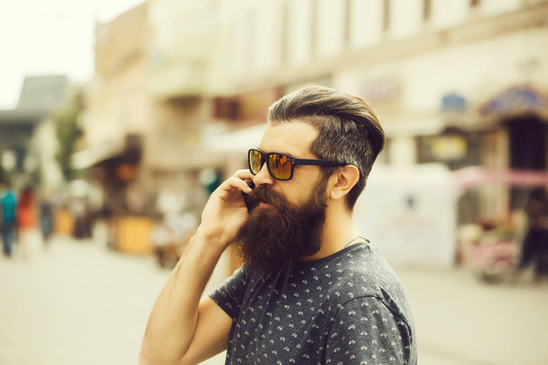 handsome bearded man in sun glasses - Zdjęcie, obraz