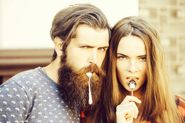 young couple with tea spoon - Foto, Imagem