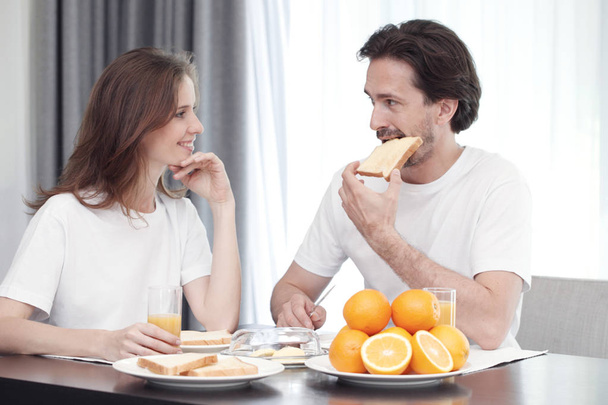 Couple having breakfast  - Фото, изображение
