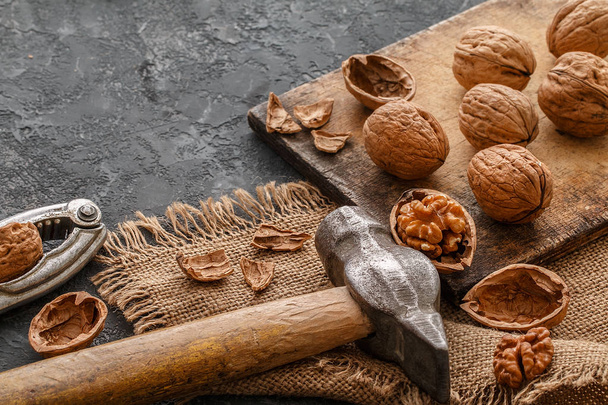 Walnuts  on a cutting board. Healthy food concept - Фото, изображение