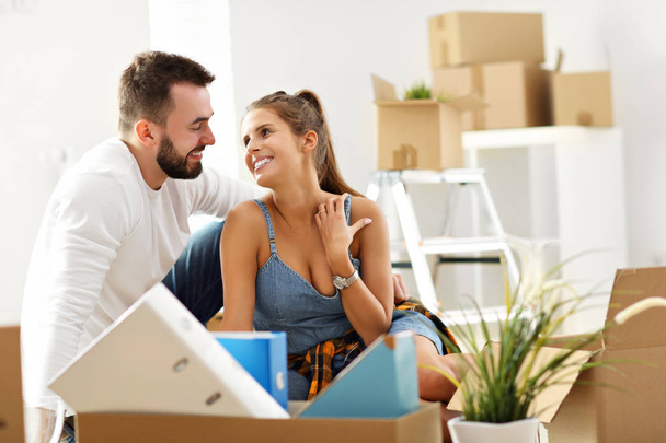 Happy adult couple moving out or in to new home - Photo, Image
