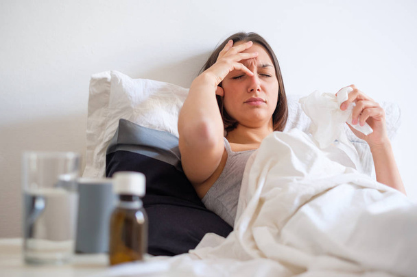 Sick woman feeling bad for cold and flu - Photo, Image