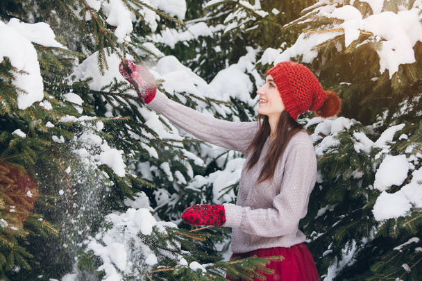 Woman having fun in winter forest  - Fotoğraf, Görsel