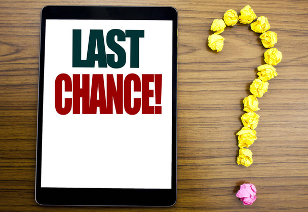 Word, writing Last Chance. Business concept for Deadline Time Ending  Written on tablet, wooden background with question mark on the end. - Photo, Image