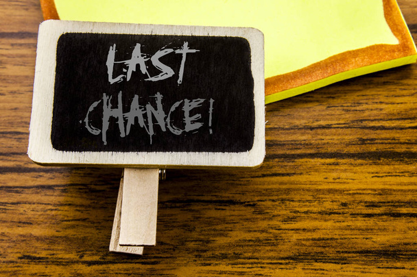 Handwritten text showing Last Chance. Business concept for Deadline Time Ending  written on announcement board on the wooden wood background. - Photo, Image