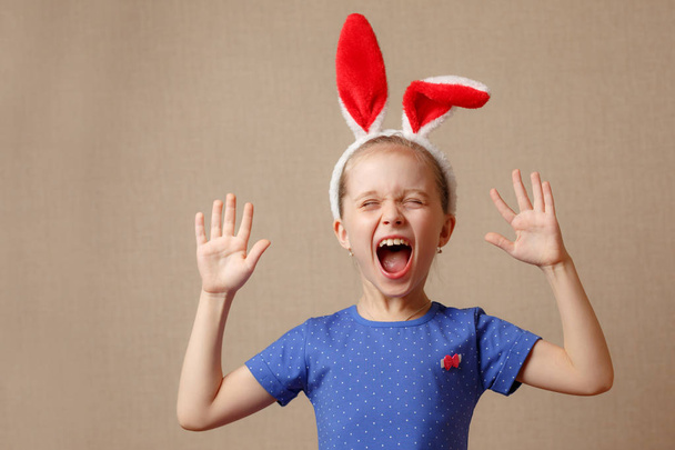 Happy easter. Child girl with bunny ears. - 写真・画像