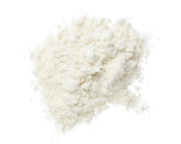 Pile de farine isolée sur fond blanc. Vue de dessus. Pose plate - Photo, image