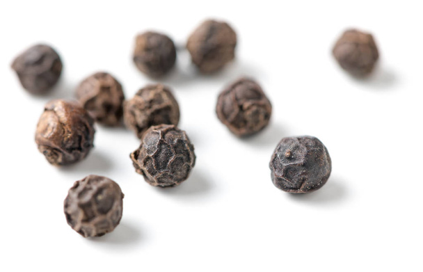 Dry black pepper isolated on white  - Photo, Image