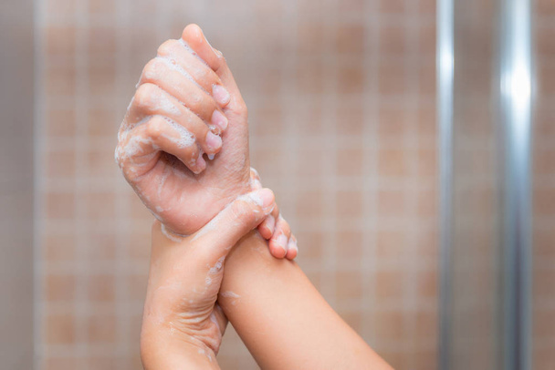 Close up of washing hands, cleaning hands - Fotó, kép