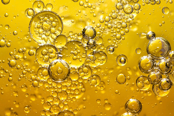 golden yellow bubble oil, abstract background - Photo, Image