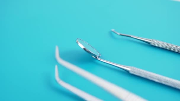 Set of dentist tools on green background - Footage, Video