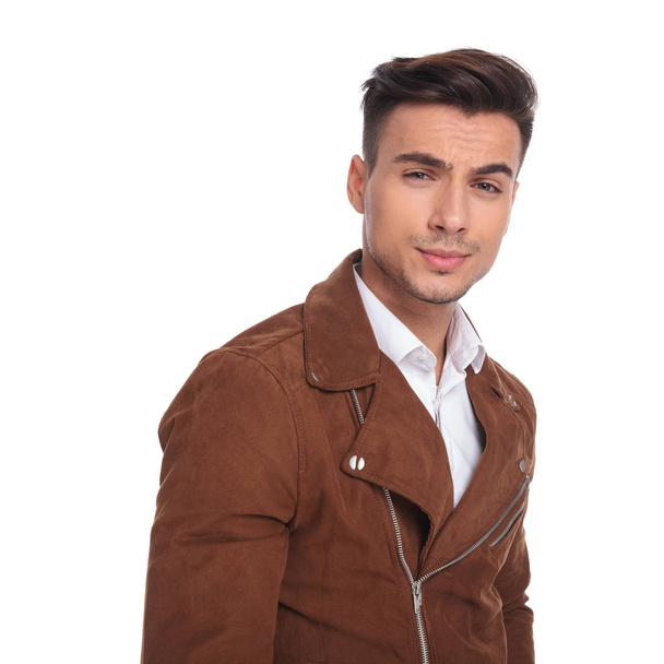 cool young man in leather jacket posing - Photo, Image