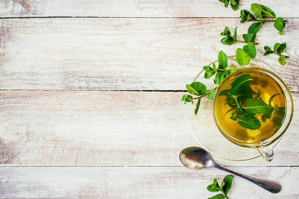 Tea with mint and lemon. Selective focus. - Photo, Image