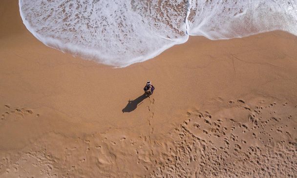View aerial of a single beach where there is a person walking  - Fotografie, Obrázek