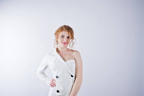 Curly hair girl isolated on white studio background. - Foto, Bild
